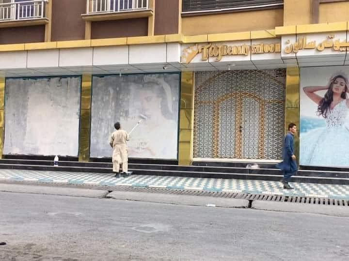Images of women at Kabul beauty salon painted over as Taliban take over Images of women at Kabul beauty salon painted over as Taliban take over