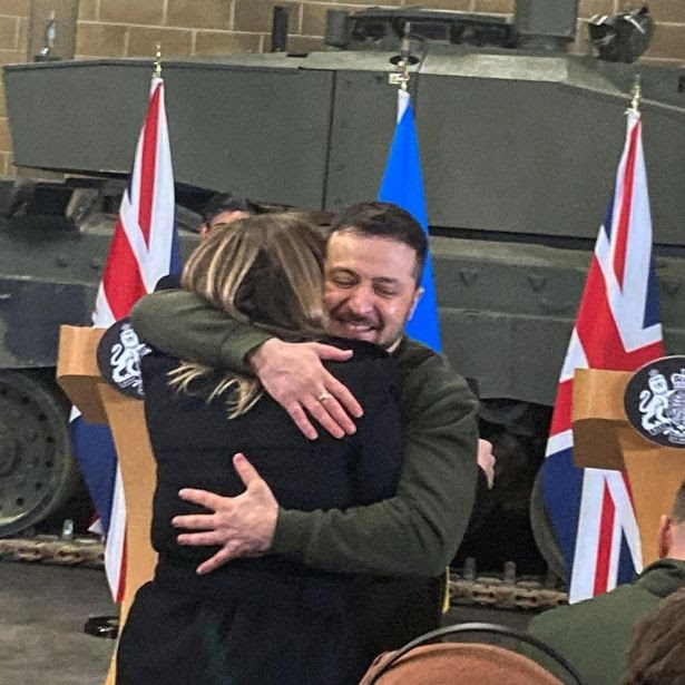 Sweet moment President Zelensky snubs security protocol to give Ukrainian reporter a hug Sweet moment President Zelensky snubs security protocol to give Ukrainian reporter a hug