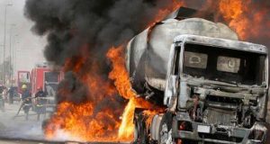 20 die while scooping fuel from falling tanker Tanker