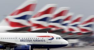 British Airways captain is held at gunpoint and stabbed during terrifying attack in South Africa British Airways