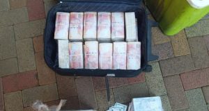 Five men arrested with bags of fake dollars Five men arrested with bags of fake dollars
