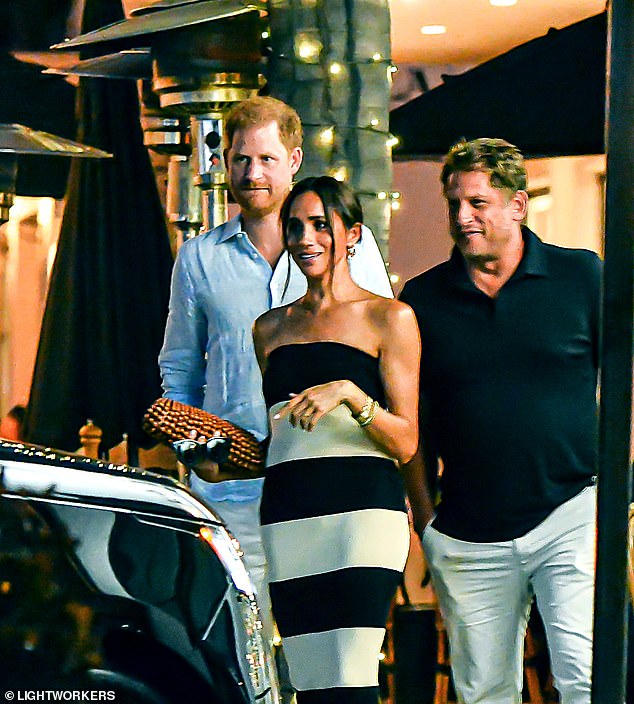 What crisis? Meghan Markle and Prince Harry step out