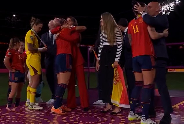Moment emotional president of Spanish FA kisses player on the mouth