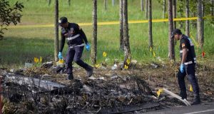 Private jet crashes onto Malaysia highway, killing 10 Private jet crashes onto Malaysia highway, killing 10