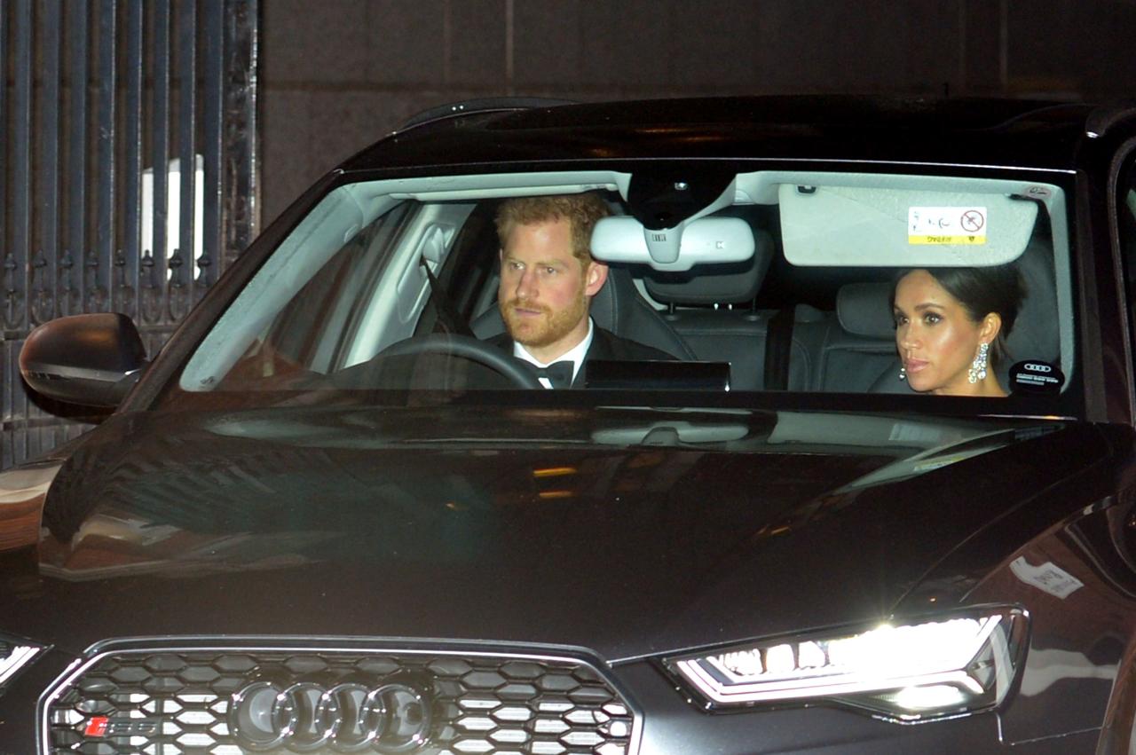 What crisis? Meghan Markle and Prince Harry step out