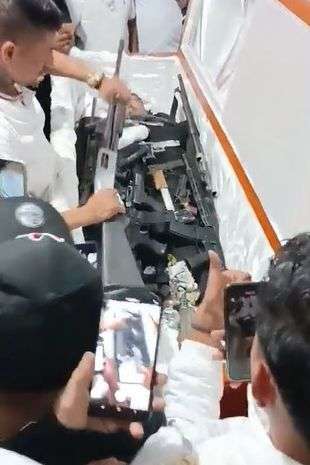 'Drug cartel boss' buried with massive guns to 'defend himself in the afterlife'

