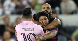 Photos: Messi’s bodyguard grabs invader by NECK Messi's bodyguard grabs invader by NECK