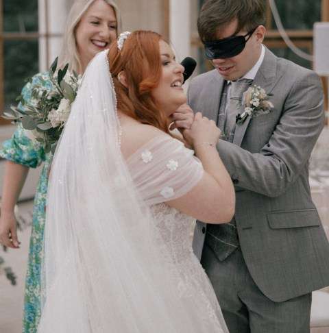 Blind bride gives eye masks to guests so they can experience wedding like her
