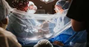 Man sues hospital after watching his wife’s C-section Man sues hospital after watching his wife's C-section