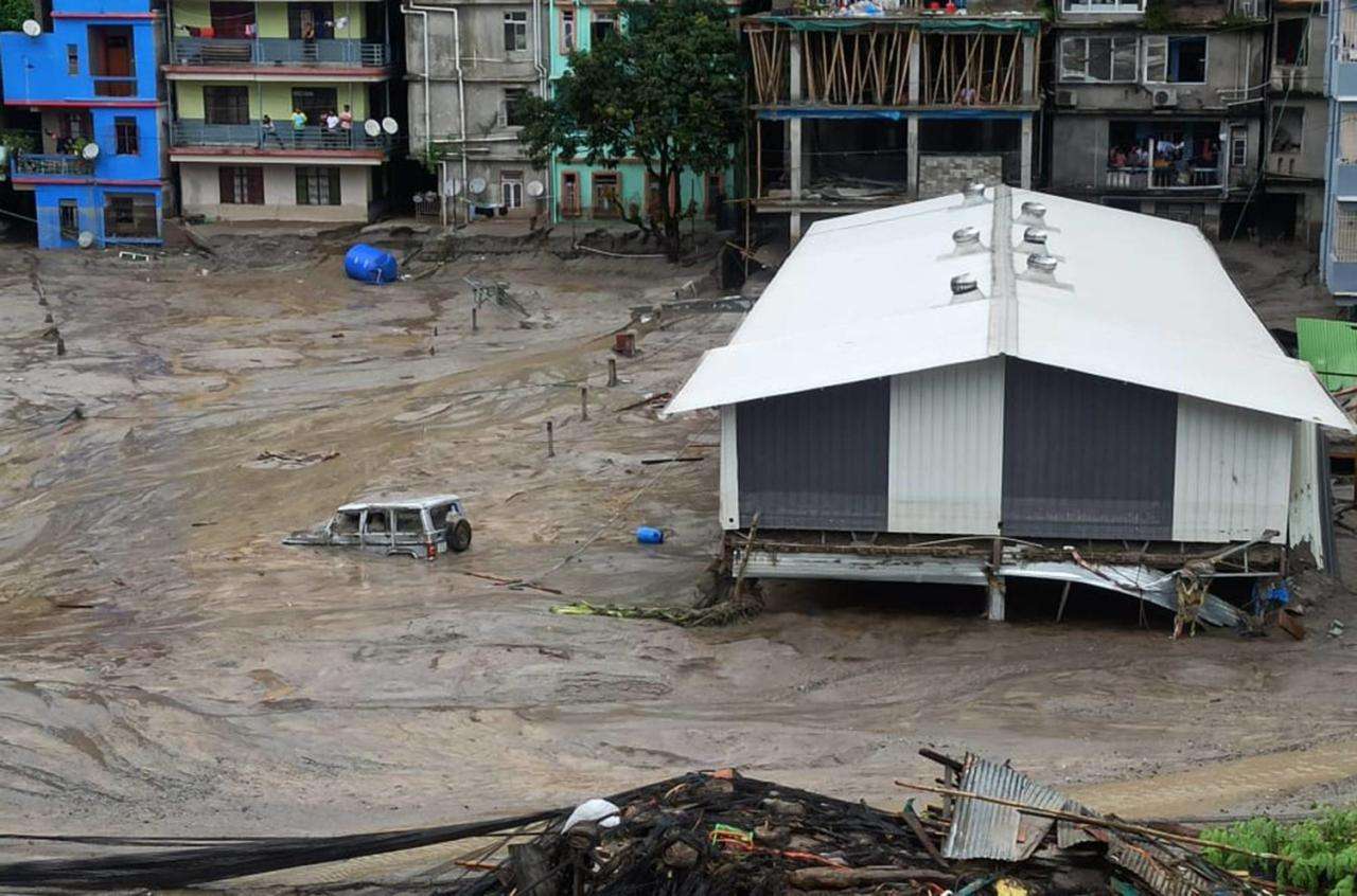 Floods in India leave 14 dead, 102 missing