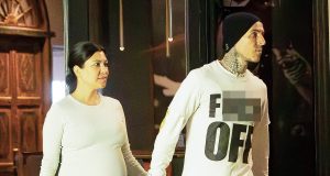 Kourtney Kardashian displays her HUGE baby bump as she steps out with husband Kourtney Kardashian displays her HUGE baby bump as she steps out with husband