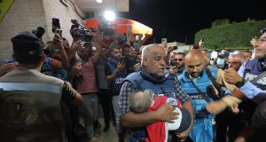 Heartbreaking video shows moment tearful Al Jazeera journalist finds out his wife and children were killed Heartbreaking video shows moment tearful Al Jazeera journalist finds out his wife and children were killed