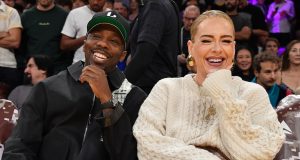 Adele flashes ring at Los Angeles Lakers Game Adele flashes ring at Los Angeles Lakers Game