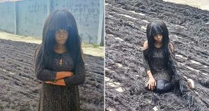 Nigerian woman sets new Guinness World Record for longest handmade wig Nigerian woman sets new Guinness World Record for longest handmade wig