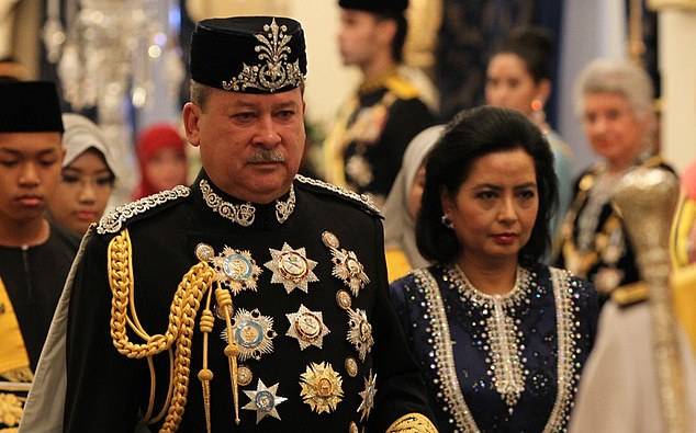 Malaysia crowns its new BILLIONAIRE king, who owns 300 luxury cars, fleet of private jets and his own ARMY