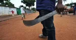 Mad man machetes worshipper inside church during deliverance Mad man machetes worshipper inside church during deliverance