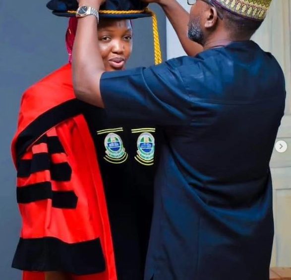 UNILAG Best PhD Thesis Awardee's husband and children dressed her up for the occasion