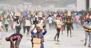 Hardship: FCT residents loot NEMA warehouse Hardship: FCT residents loot NEMA warehouse