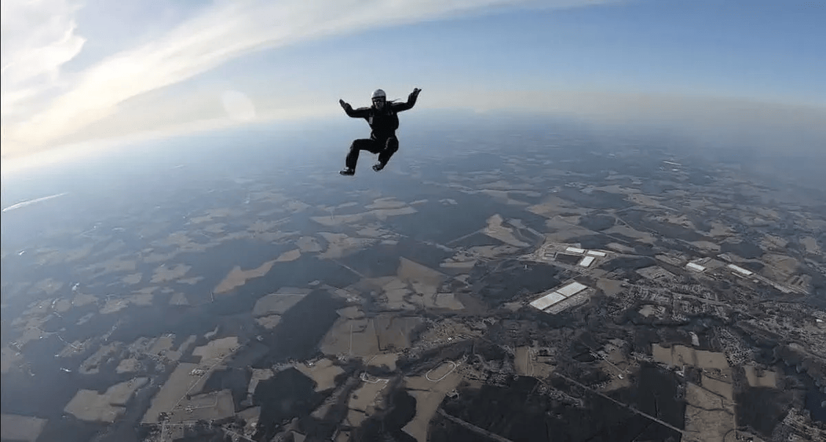 Woman survives skydive after parachute fails