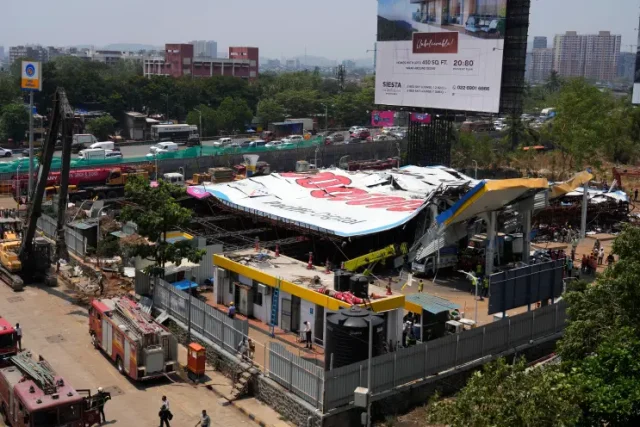 14 DI3 as billboard falls in India