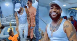 Fans gush as little boy goes on both knees to greet Davido Fans gush as little boy goes on both knees to greet Davido
