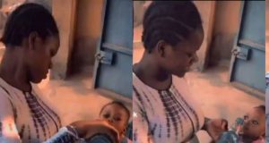 Outrage as lady feeds beer to her little baby Outrage as lady feeds beer to her little baby