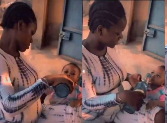 Outrage as lady feeds beer to her little baby