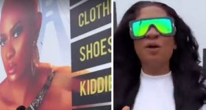 May Edochie admires her photo on a billboard May Edochie steps out of her car to admire her photo on billboard