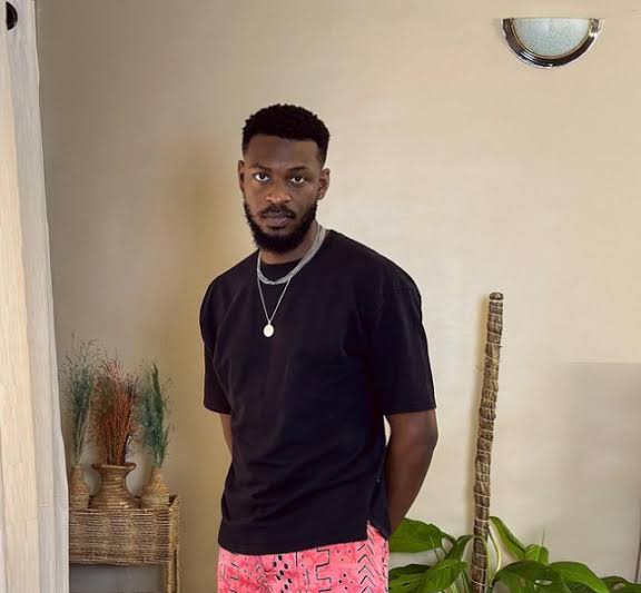 BBNaija's Adekunle slams fan for demanding reasons on his absence at AMVCA10