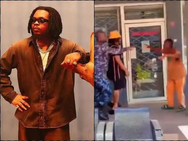 Reactions as Olamide snubs fan while hailing him