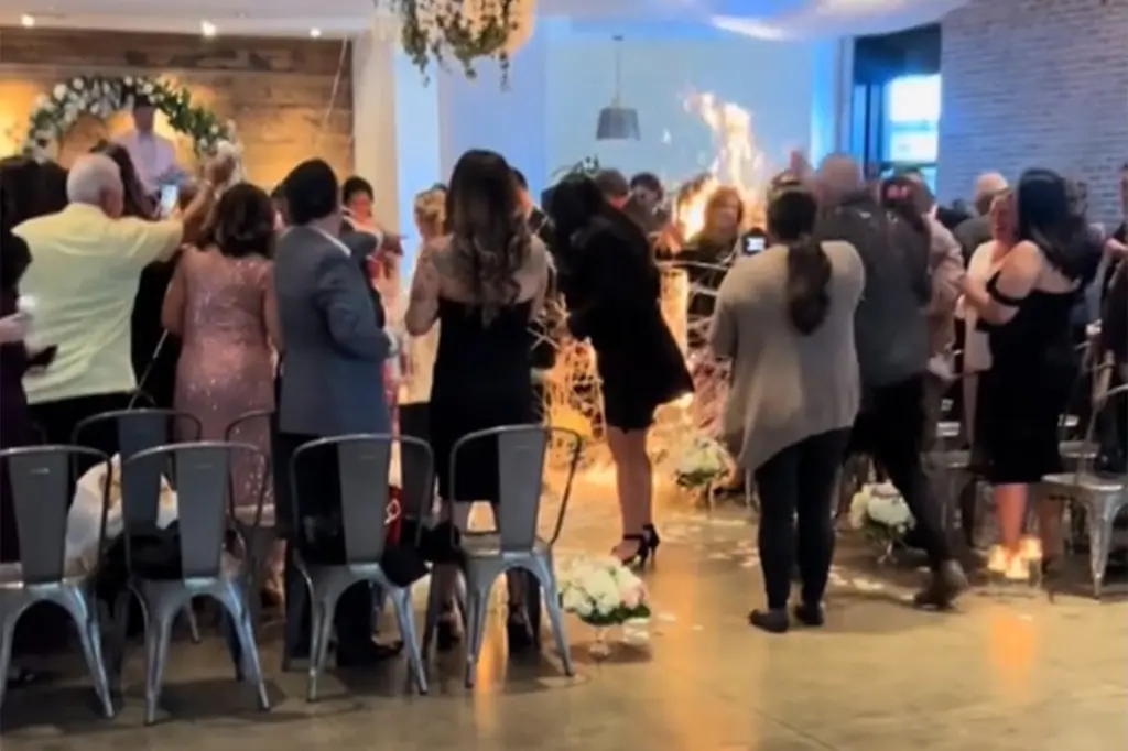 Bride’s wedding dress catches FIRE Bride’s wedding dress catches FIRE
