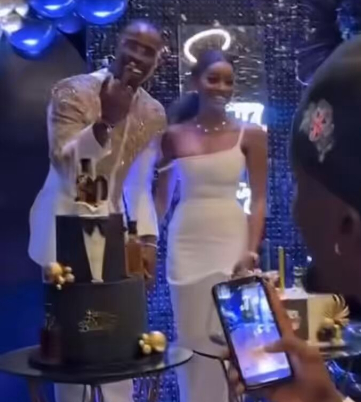 Neo Akpofure and partner, Beauty display affection at his birthday dinner