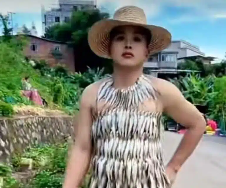 Woman creates viral sensation with dress made entirely of raw fish