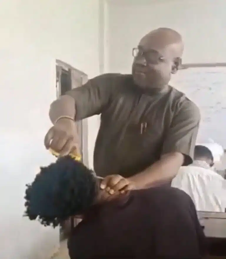 Unizik lecturer cuts student’s hairstyle with scissors