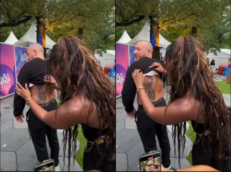 Tems meets fan who tattooed her face on his back Tems meets fan who tattooed her face on his back