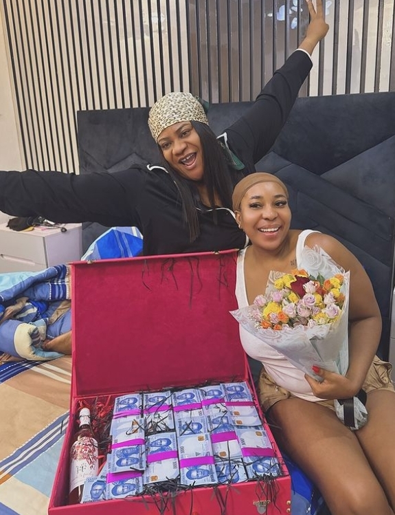 Nkechi Blessing gifts younger sister wads of cash on her birthday