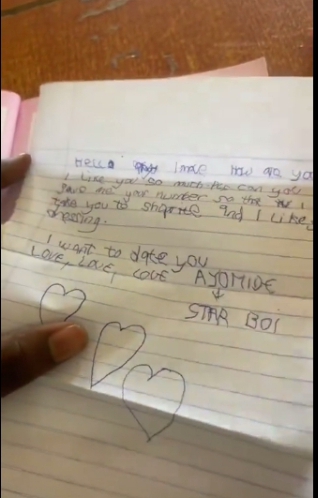 Lady frustrated after student sends love letter to her during teaching practice
