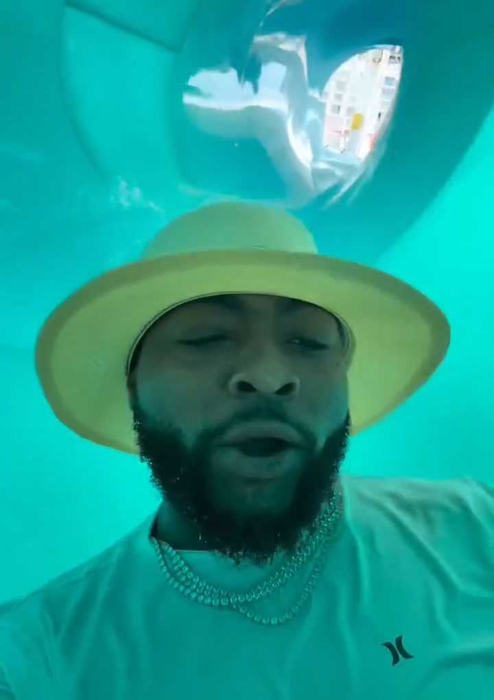 Davido shows his playful side at Bahamas waterslide