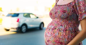 Woman pregnant with TWINS run over while changing tyre Woman pregnant with TWINS run over while changing tyre