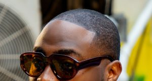 Davido acknowledges fan with Down Syndrome at a club Davido acknowledges fan with Down Syndrome at a club