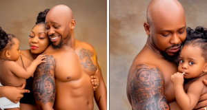 Man tattoos wife & daughter’s faces on his arm Man tattoos wife & daughter's faces on his arm