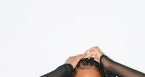 Tems fires back at troll for body shaming her Tems fires back at troll for body shaming her