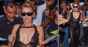 Miley Cyrus frees the n!pple in plunging SHEER gown Miley Cyrus frees the n!pple in plunging SHEER gown