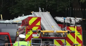 15 rushed to hospital after bus collides with bridge leaving its roof RIPPED OFF