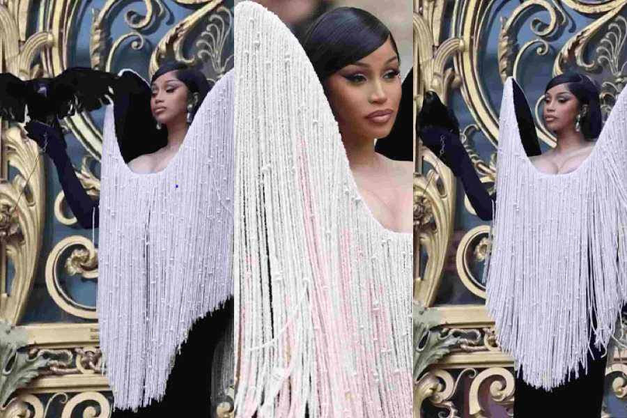 Cardi B uses live crow as fashion accessory for Paris couture