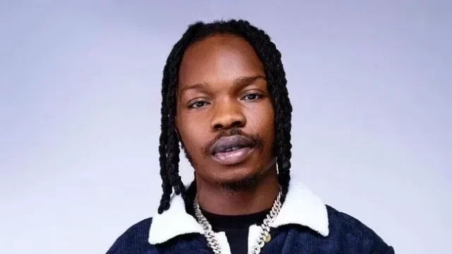 Naira Marley has launched a scathing attack on his critics, praying that they suffer in life, death, and beyond