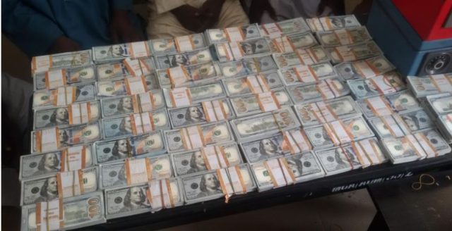 Police arrest man with fake $1,000