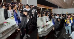 Widow TWERKS against her late husband’s open coffin during his funeral Widow TWERKS against her late husband's open coffin during his funeral