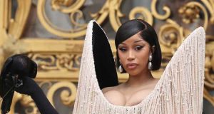 Cardi B uses live crow as fashion accessory for Paris couture Cardi B uses live crow as fashion accessory for Paris couture