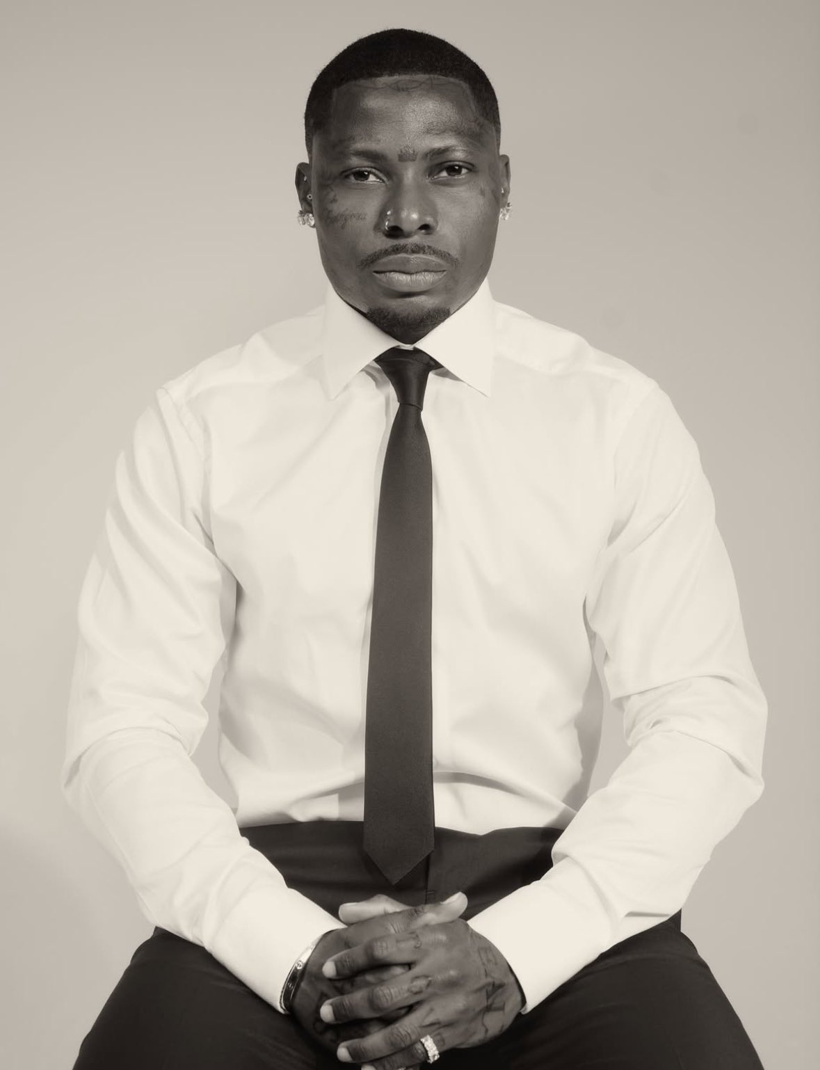 Asake unveils new look